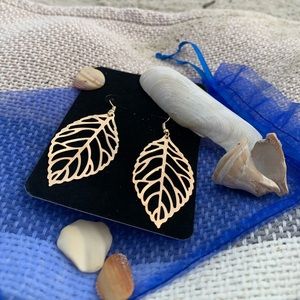 Gold tone open work leaf pierced earrings